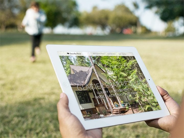 Glacier Bear Retreat website viewed on an iPad tablet.