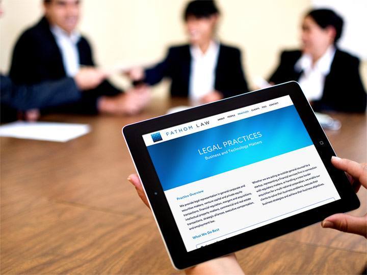 Fathom Law website viewed on an iPad tablet.