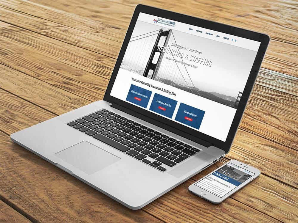 McDermott Wolfe website viewed on a MacBook Pro and iPhone.