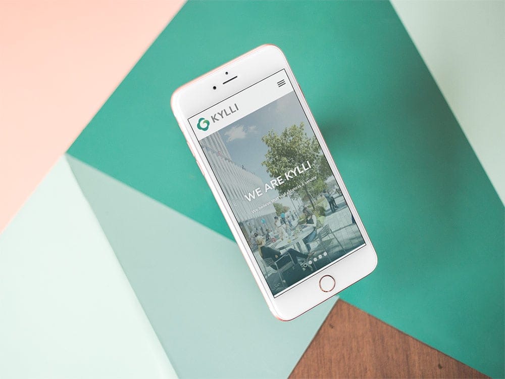 Kylli website viewed on a white iPhone.